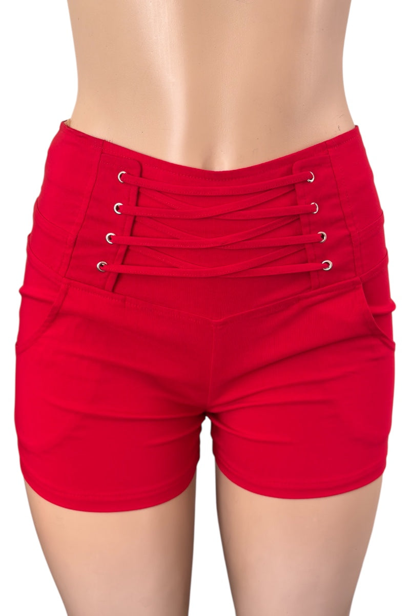 Red shorts with metal rings on a white background