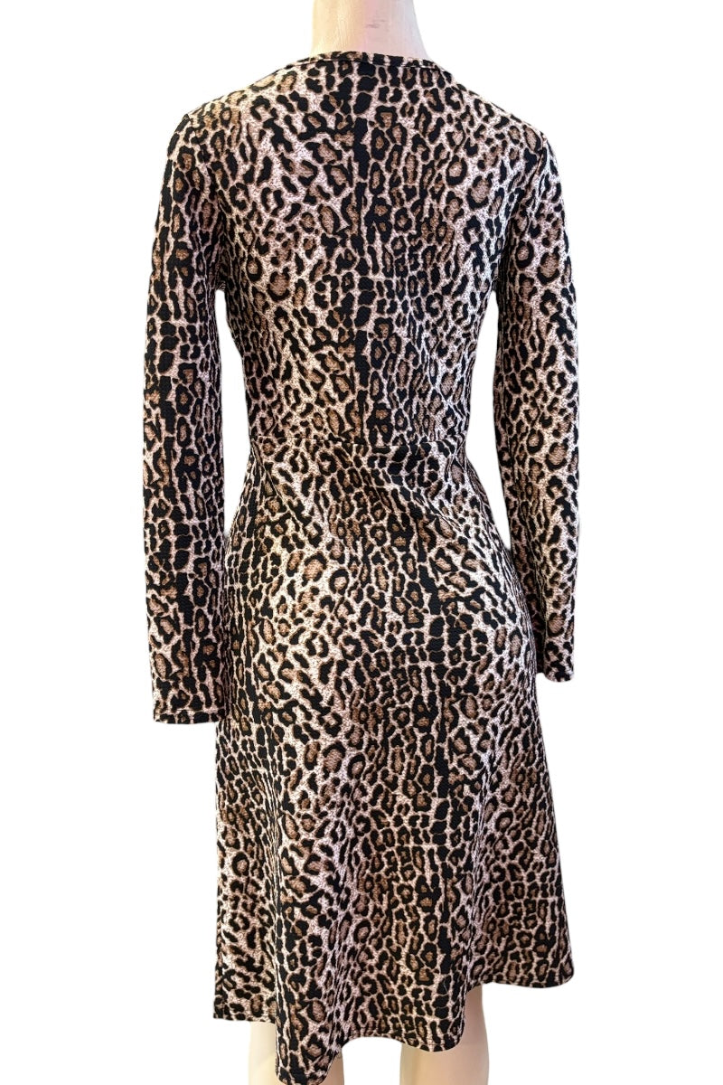 Leopard print dress on a mannequin against a white background