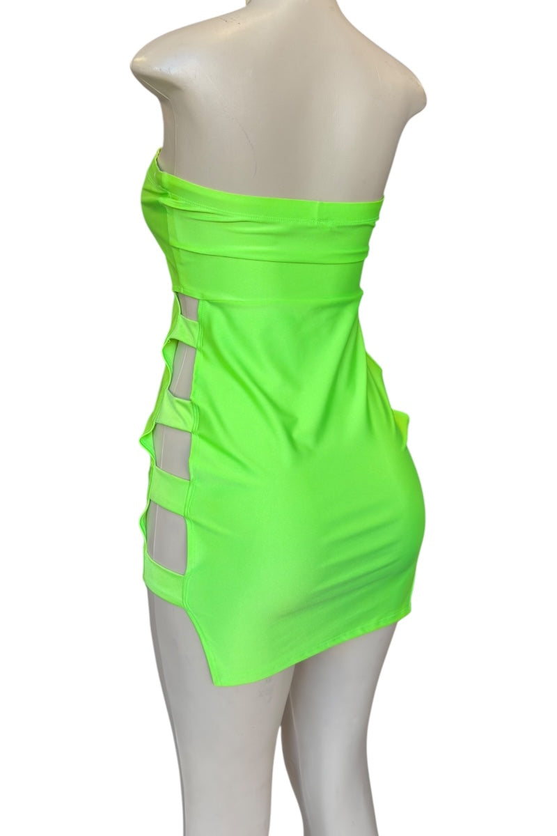 Neon green strapless dress on a mannequin against a white background