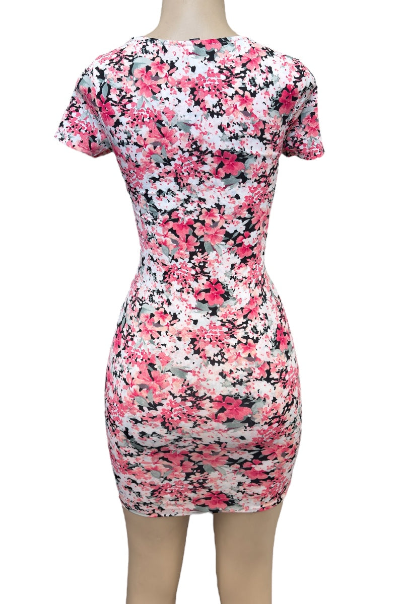 pink Floral patterned dress on a mannequin against a white background