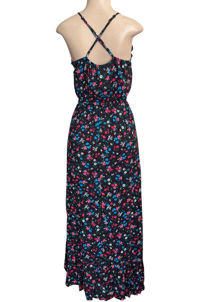 Floral dress on a mannequin against a white background