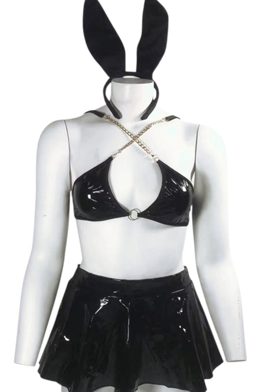 Black vinyl costume with a halter top and skirt on a mannequin against a white background