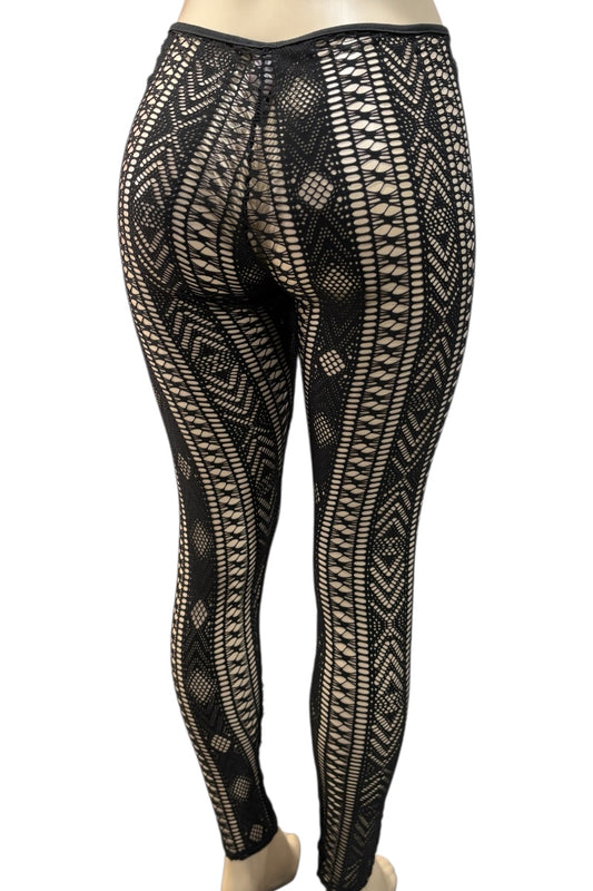 Black leggings with white geometric pattern on a white background