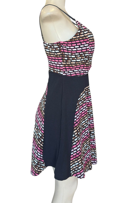 Dress with a patterned top and solid skirt on a mannequin against a white background