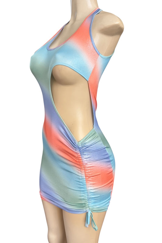 Multicolored tie-dye dress on a mannequin against a white background