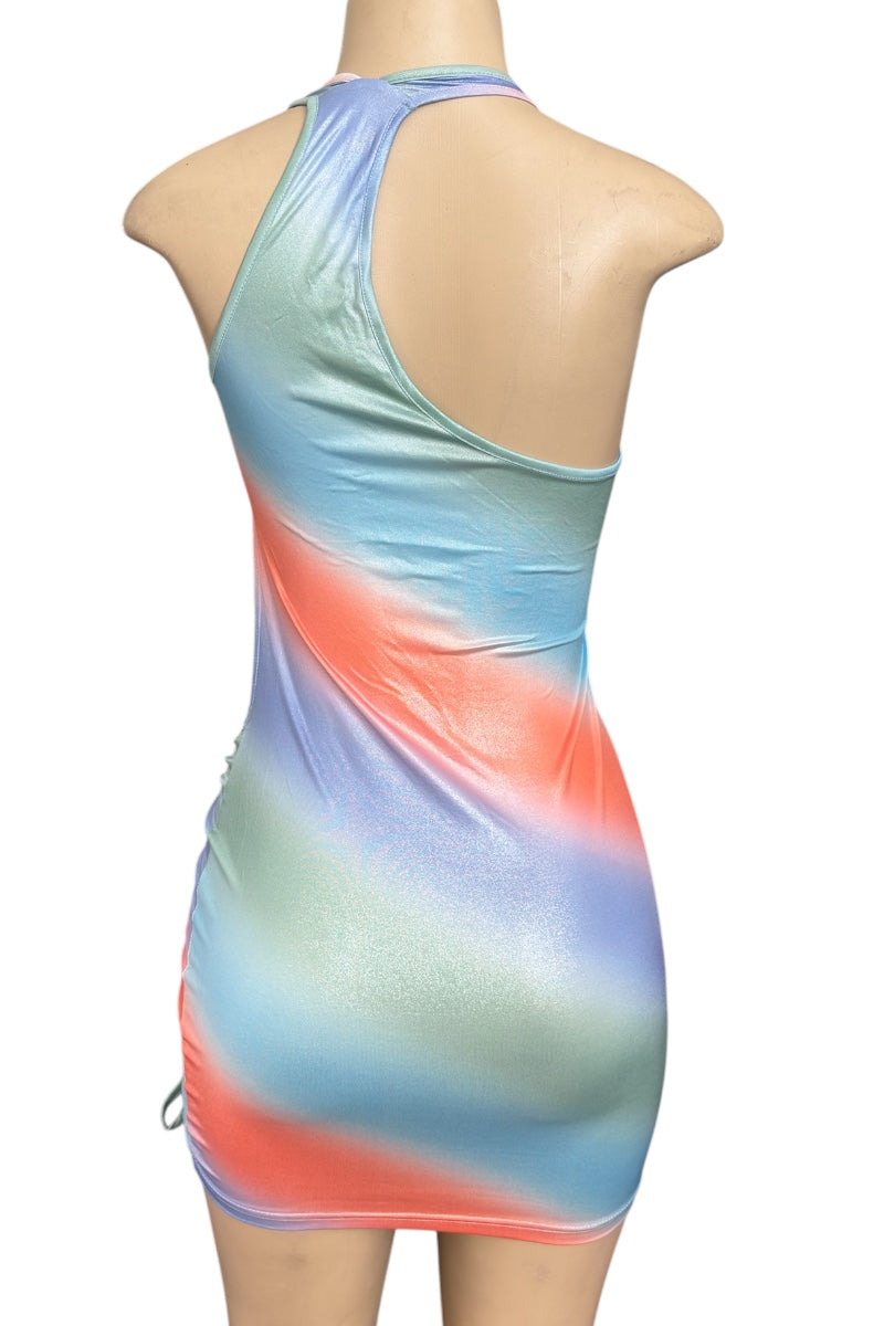 Multicolored dress on a mannequin against a white background