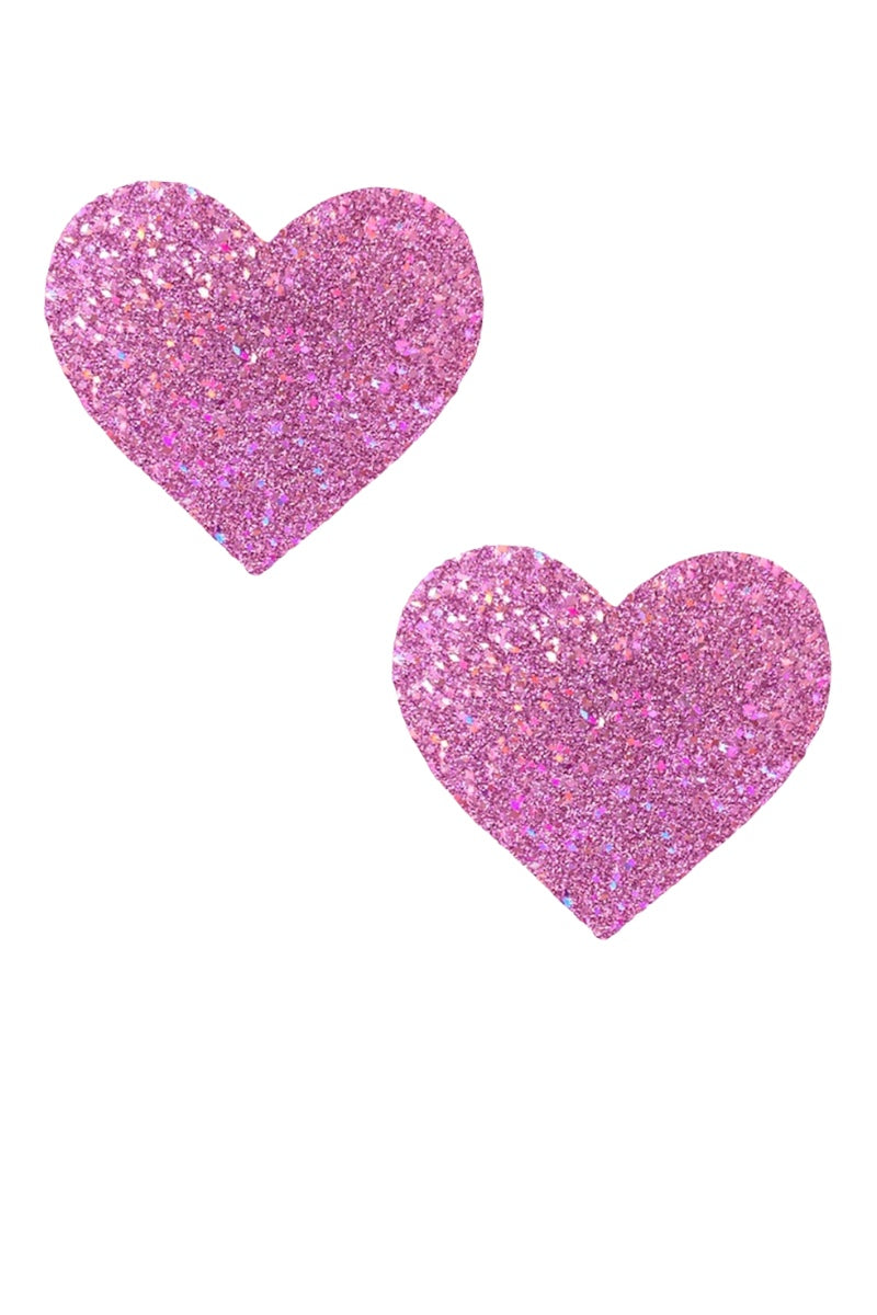 Two pink glittery heart-shaped pasties on a white background