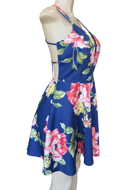 Blue dress with pink floral pattern on a mannequin against a white background