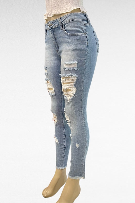 Mid Rise Destructed Skinny Jeans