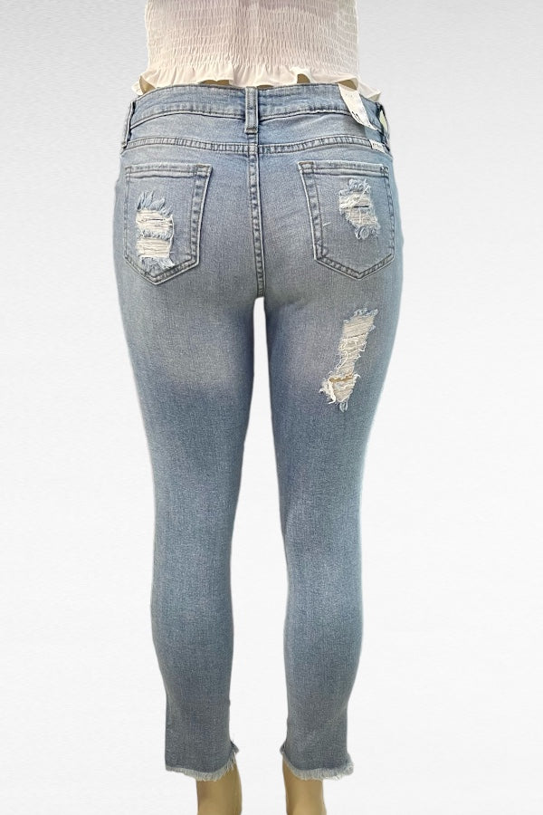 Mid Rise Destructed Skinny Jeans