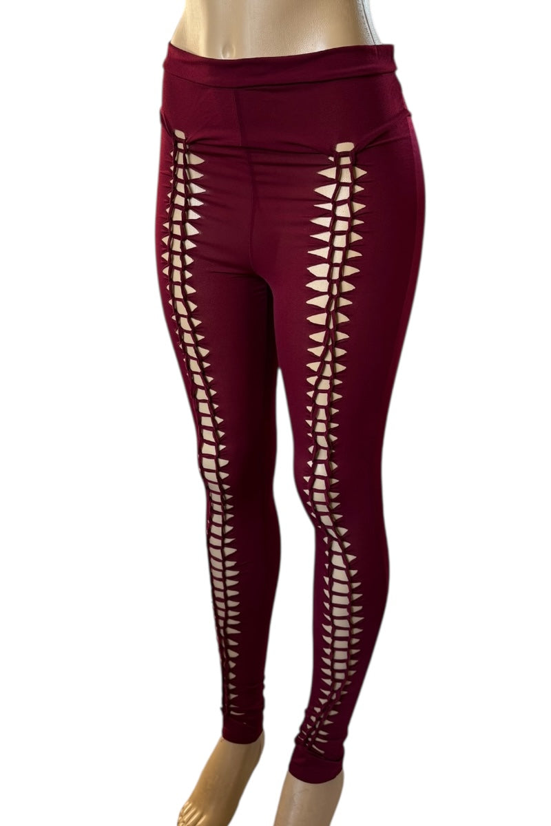 burgundy leggings with cut-out design on a white background