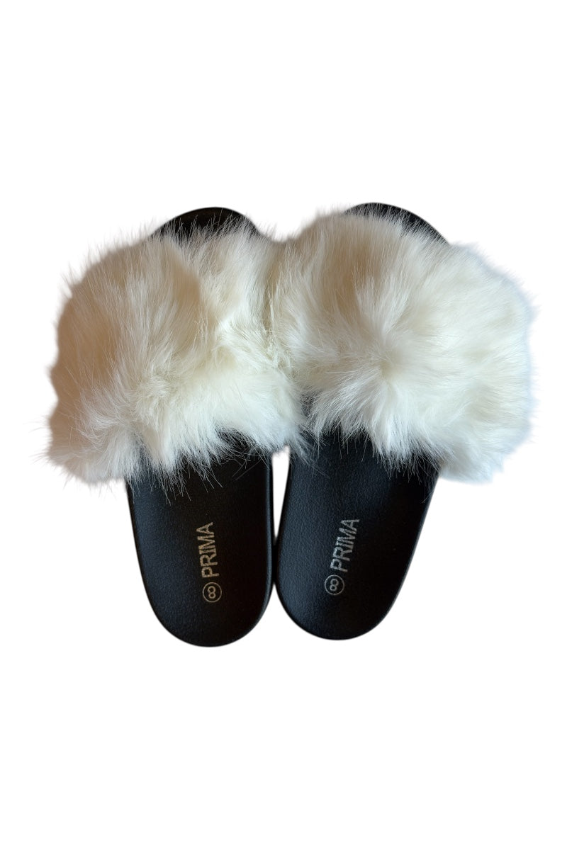 Pair of black slippers with white fur on a white background