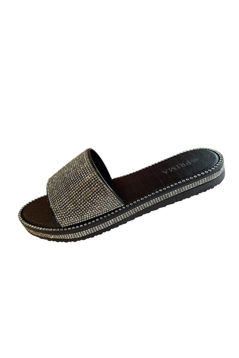 Black slide sandal with rhinestone embellishments on a white background