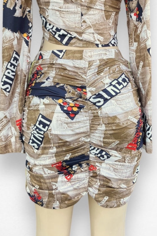 Patterned skirt with text and graphics on a mannequin against a white background