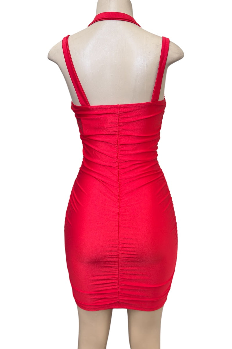 Red dress on a mannequin against a white background