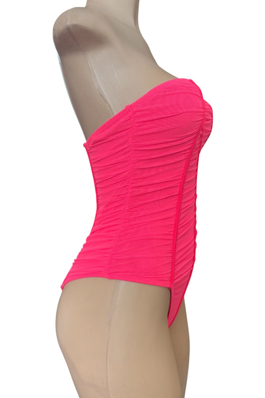 Hot pink strapless bodysuit on a mannequin against a white background