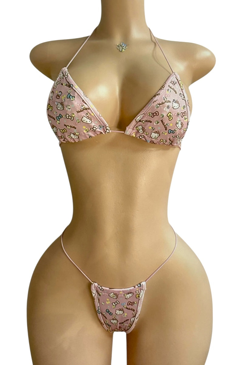Bikini set with floral pattern on a mannequin against a white background