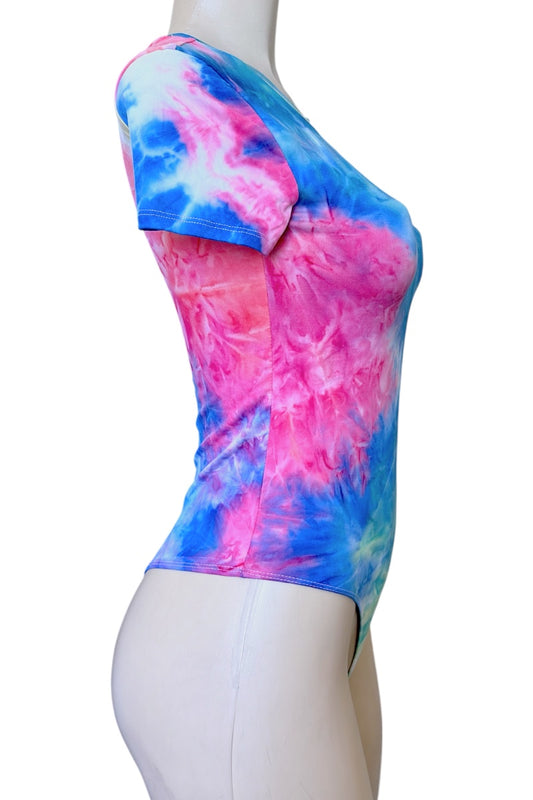 Tie-dye top on a mannequin against a white background