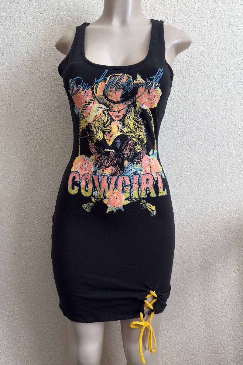 Black tank dress with colorful 'Cowgirl' graphic on a mannequin against a white background