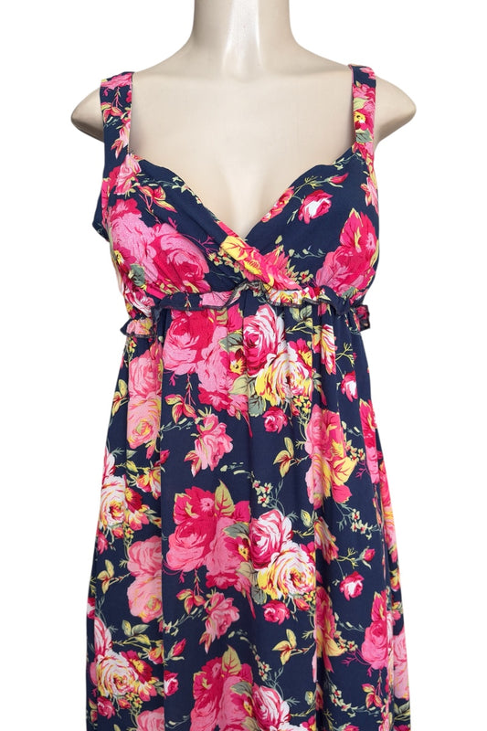 Floral dress on a mannequin with a white background