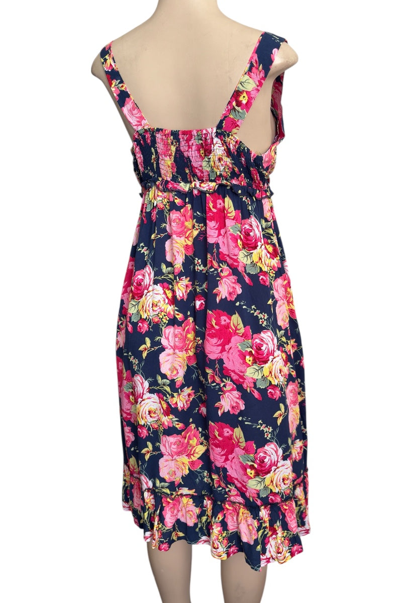 Floral dress on a mannequin with a white background