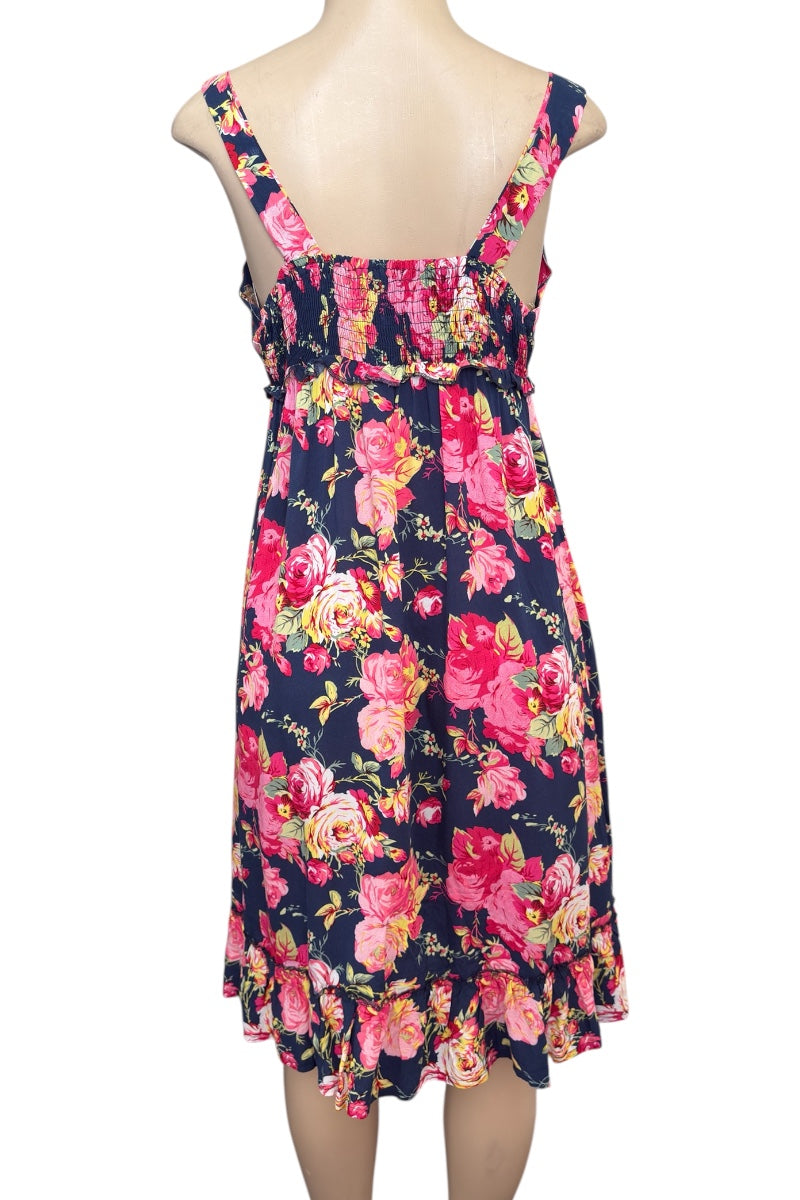 Floral dress on a mannequin with a white background