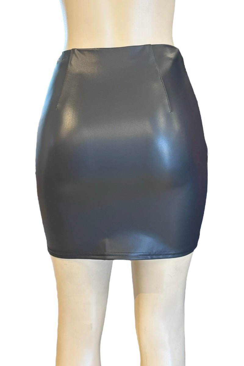 Black shiny skirt on a mannequin against a white background