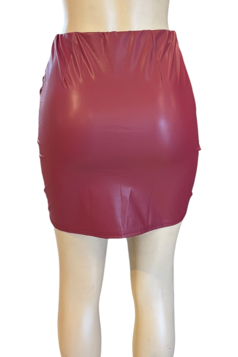 wine vinyl skirt on a mannequin against a white background