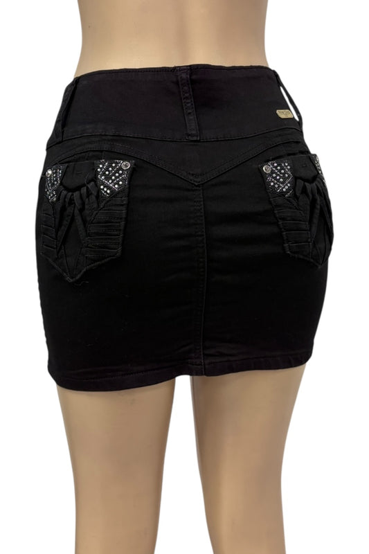 Black skirt with rhinestone accents on a mannequin against a white background
