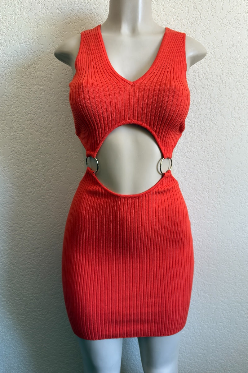 Neon Orange ribbed dress with cut-out design on a mannequin against a white background