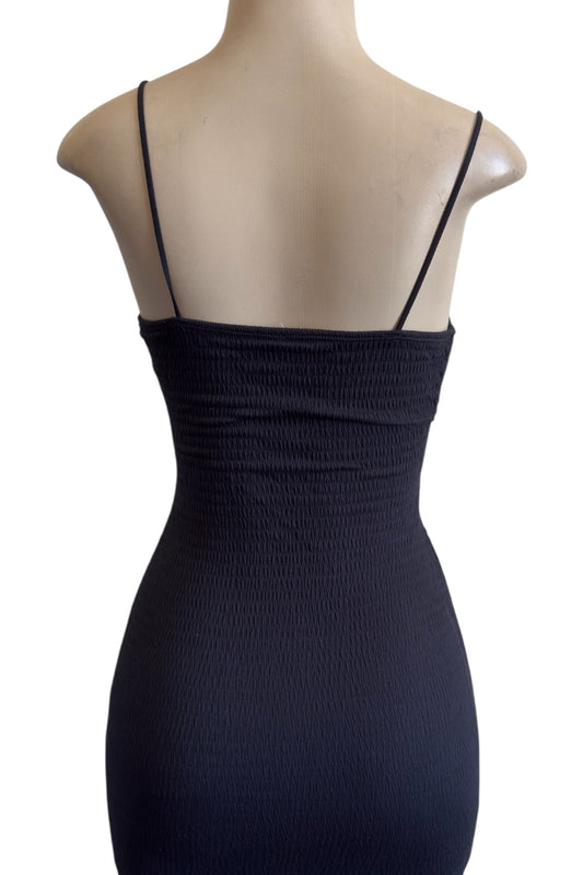 Black dress on a mannequin with a white background