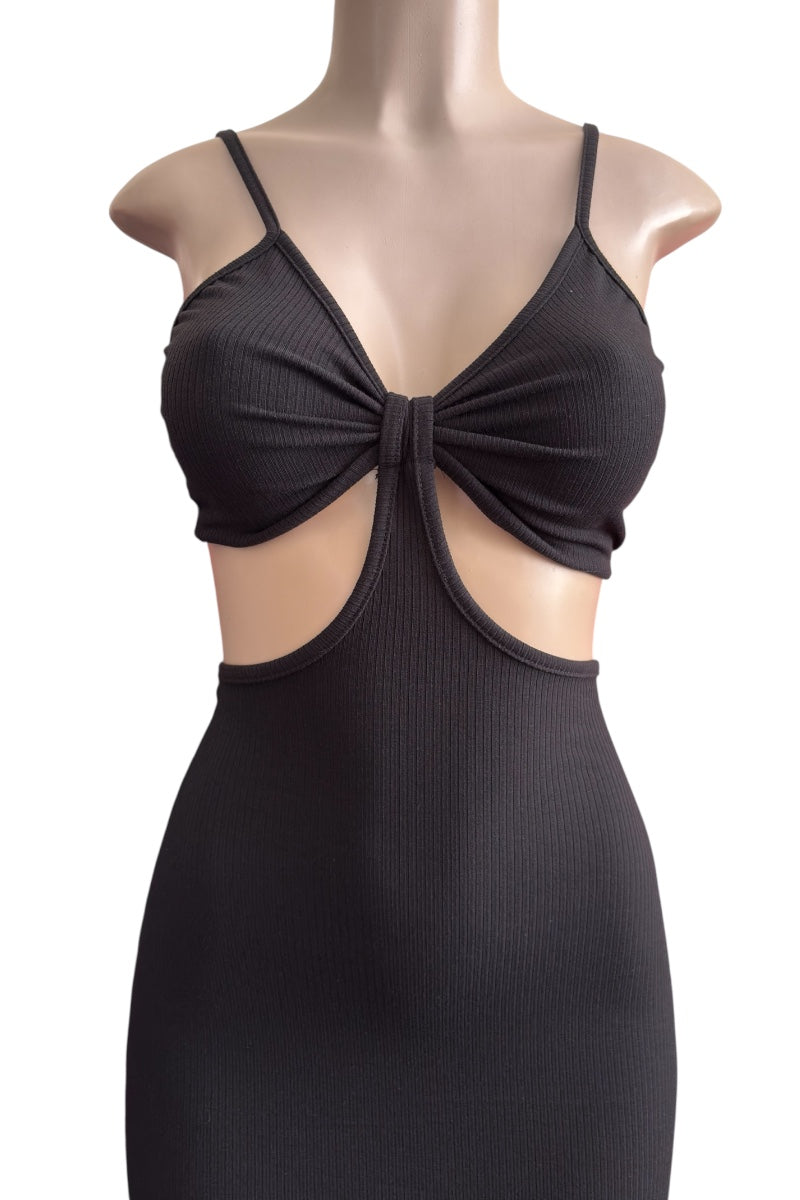 Black dress with cut-out design on a mannequin against a white background
