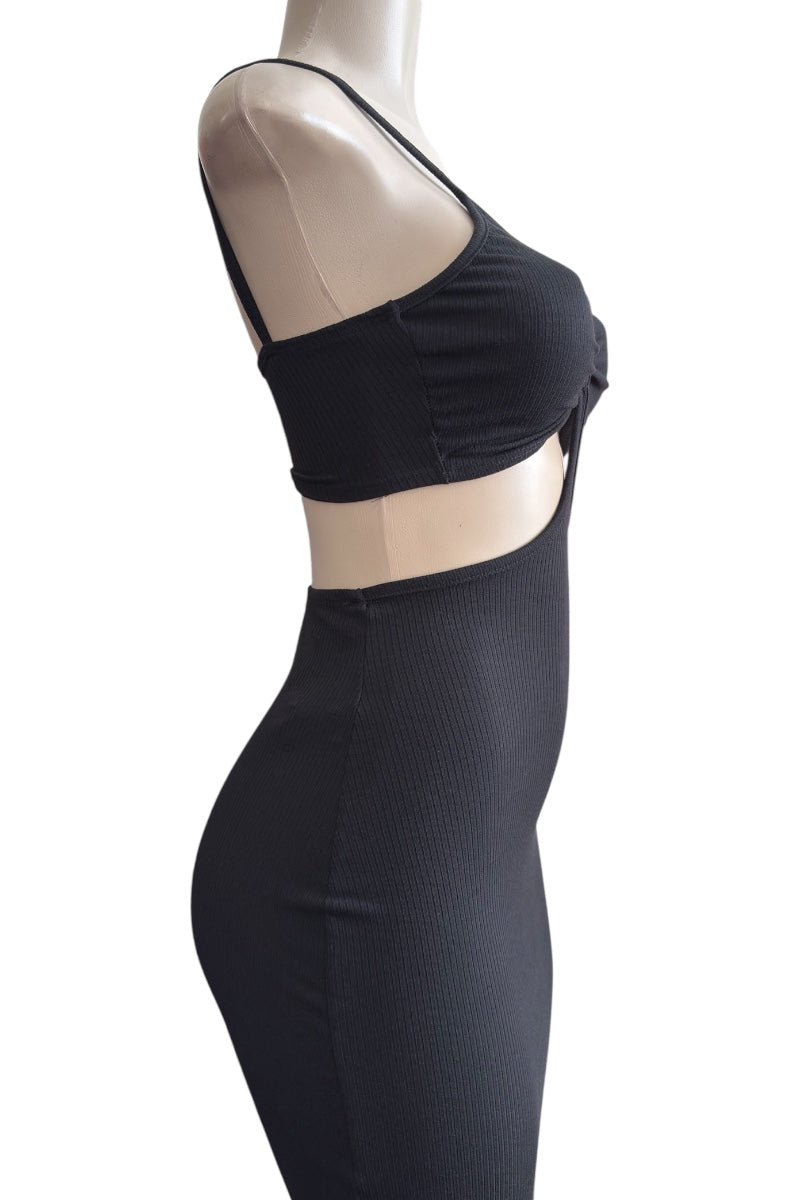 Black dress on a mannequin against a white background