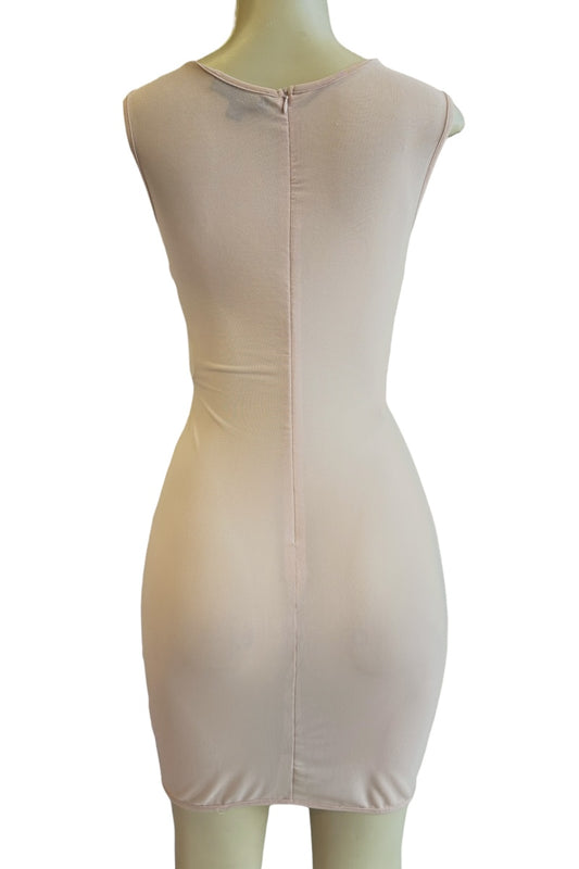 pink dress on a mannequin against a white background