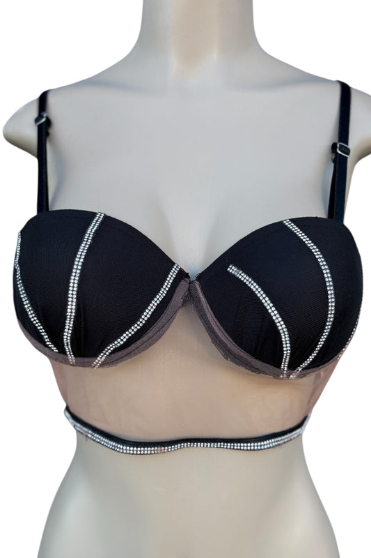 Black bra top with decorative stitching on a mannequin against a white background