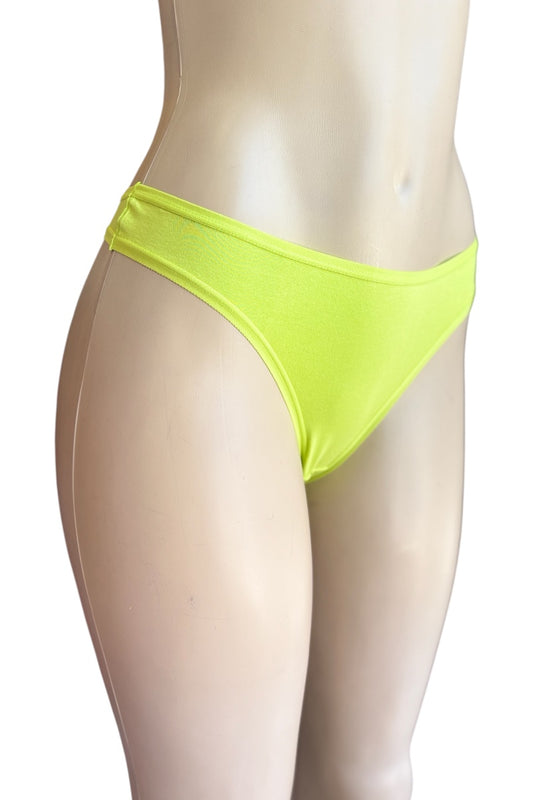 Neon green bikini bottom on a mannequin against a white background