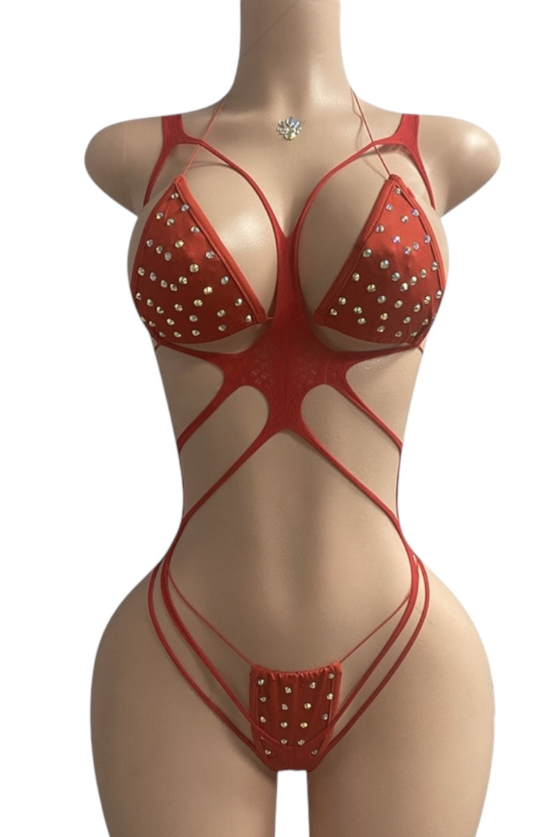 Red lingerie set with rhinestone embellishments on a mannequin against a white background