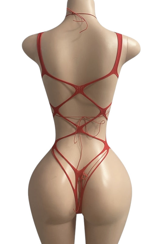Red strappy bodysuit on a mannequin against a white background
