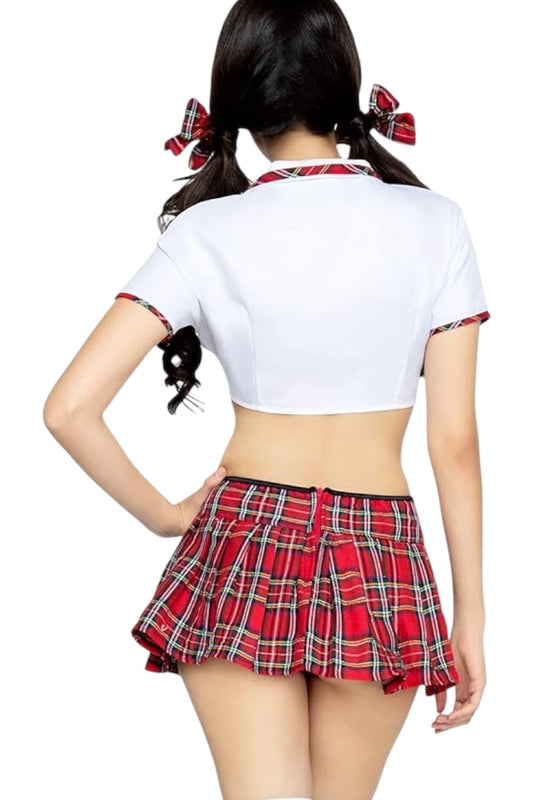Person wearing a white crop top and red plaid skirt with pigtails on a white background