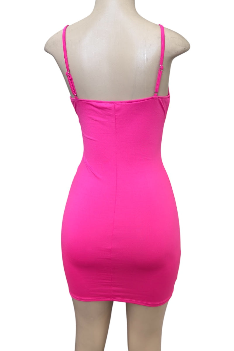 Hot pink dress on a mannequin with a white background