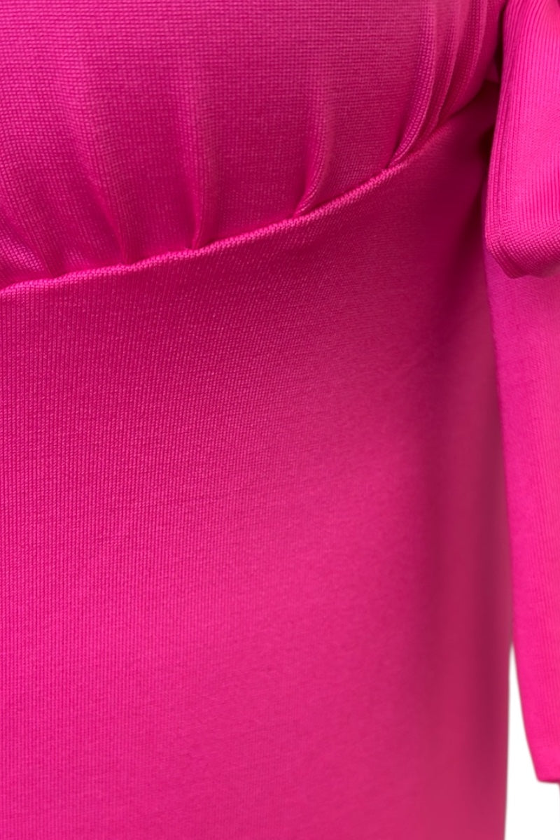 Close-up of a bright pink fabric texture
