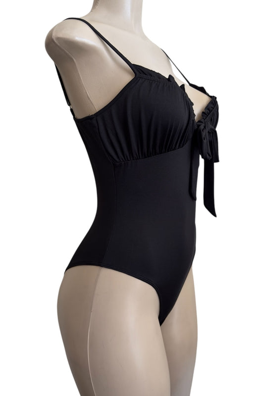 Black bodysuit on a mannequin against a white background