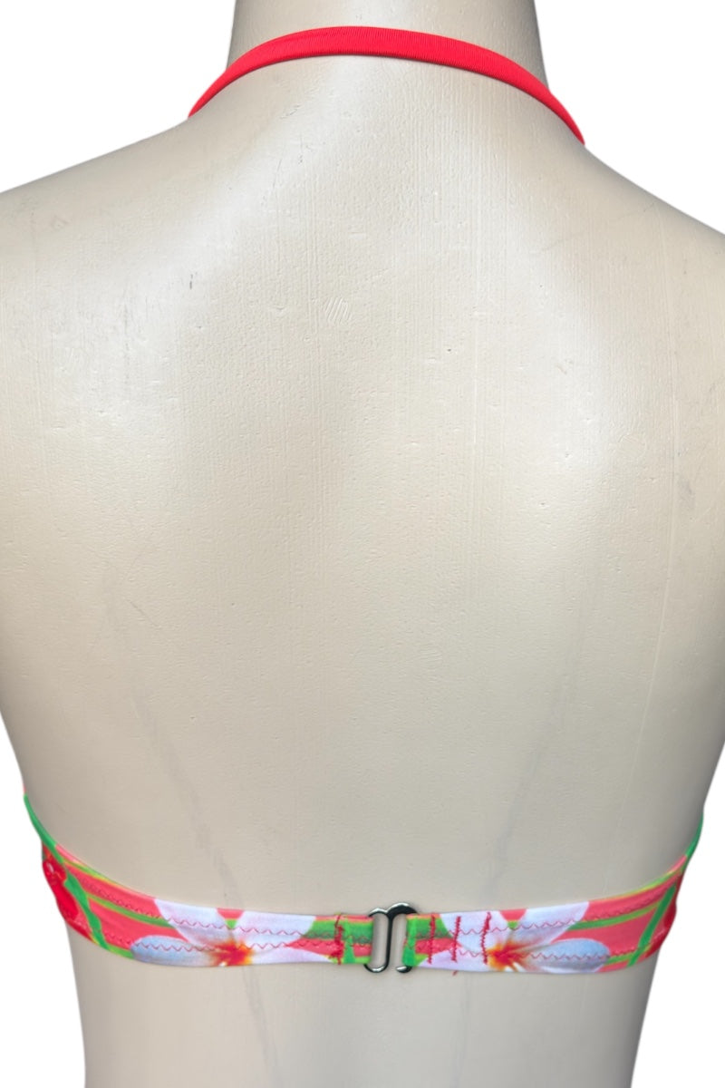 Bikini top with floral design on a mannequin against a white background