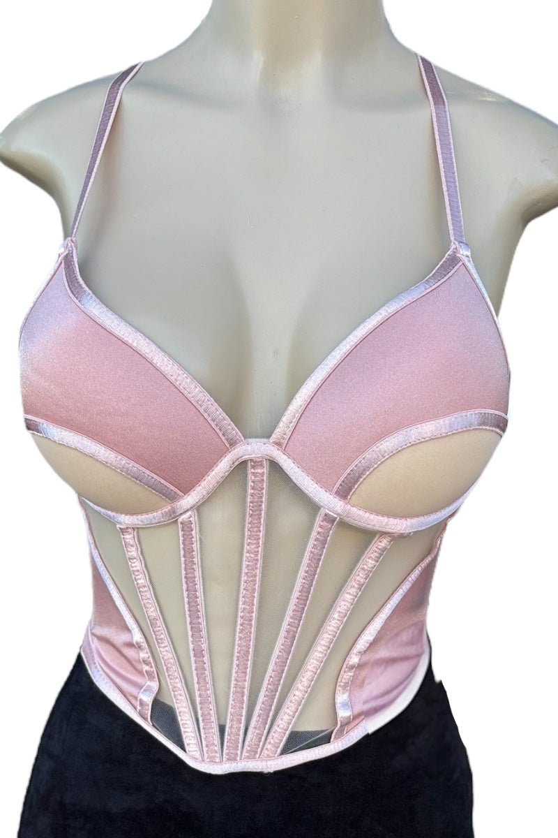 Pink corset top on a mannequin against a white background