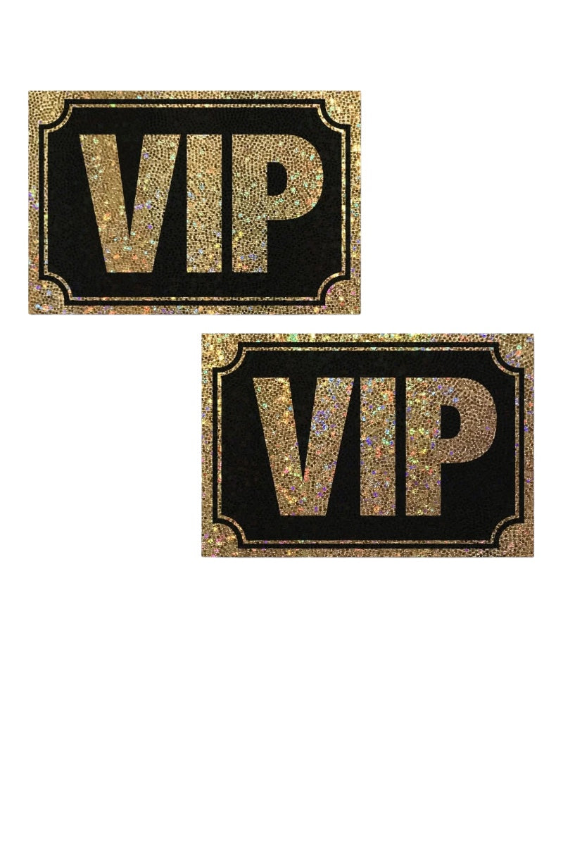 Two VIP stickers with gold text on black backgrounds.