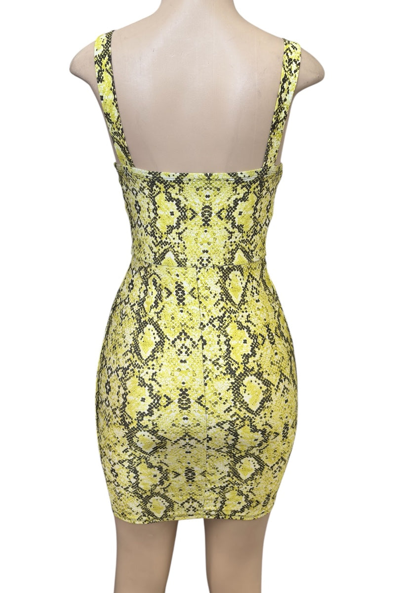 Yellow snake print dress on a mannequin against a white background
