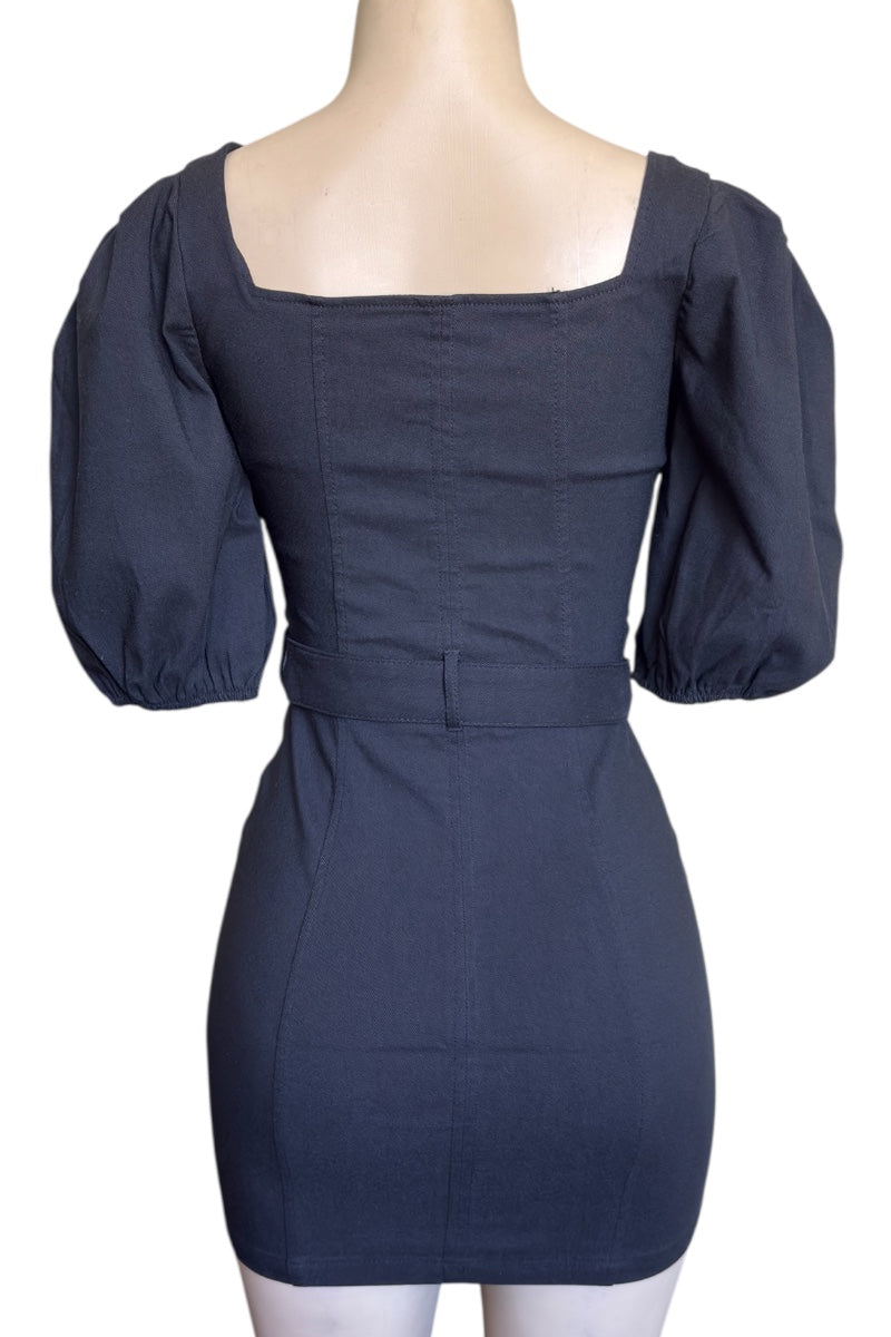 Black dress with puffed sleeves on a mannequin against a white background