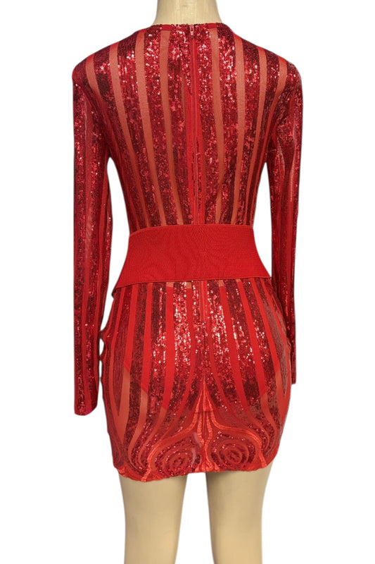 Red sequin dress on a mannequin against a white background