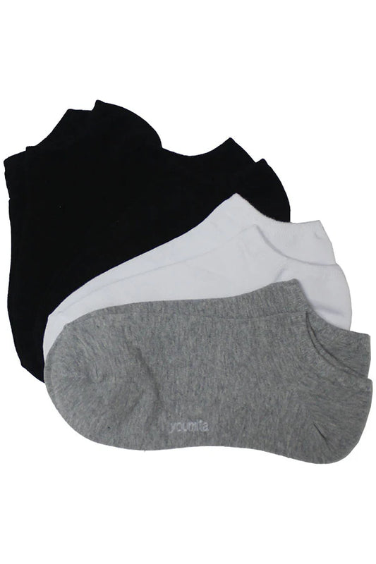 Three pairs of socks in black, white, and gray on a white background