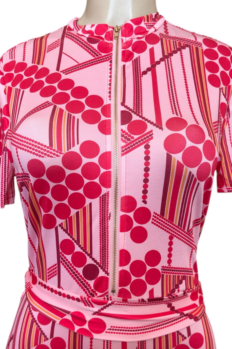 Pink patterned outfit on a mannequin